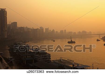 Stock Image - China, Chongqing, Convergence Of Two Rivers, Chaotianmen Pier. Fotosearch