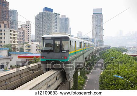 Stock Image - China, Chongqing, Light Rail Train. Fotosearch