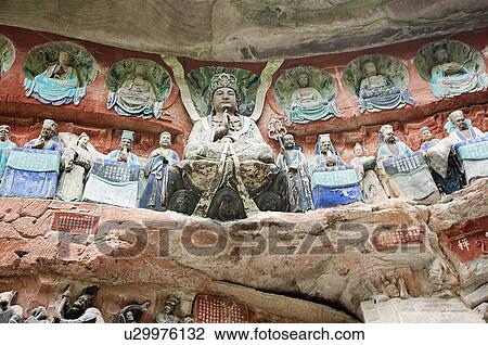 Stock Image - A Scene of the Hell in Chongqing, The Dazu Rock Carvings, China. Fotosearch