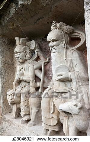 Stock Image - Statue Of Mountain Deity, The Dazu Rock Carvings, Chongqing, China. Fotosearch