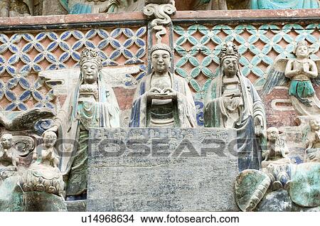 Picture - Stone Carving of a Story from the Scripture on Nahopaya Buddha’s Requital of Kindness in Chongqing, The Dazu Rock Carvings, China. Fotosearch