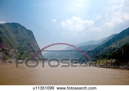 Stock Photo - Wu Gorge Bridge on Yangtze River, Wu Gorge, Three Gorges in Yangtze River, China. Fotosearch