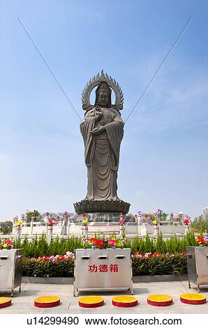 Stock Image - China, Hubei Province, Wuhan, Hanyang, Guiyuan Temple, Statue of Guanyin. Fotosearch