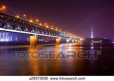Stock Photograph - China, Hubei Province, Wuhan, Wuchang, Wuhan Yangtze River Bridge, Nightlife. Fotosearch