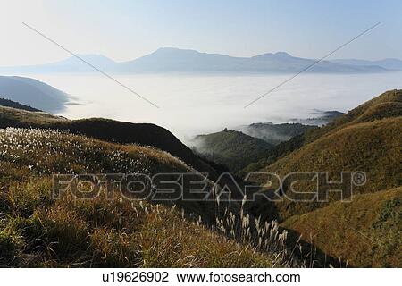 Stock Image - Field of Clouds at Mount Aso, Aso, Kumamoto, Japan. Fotosearch