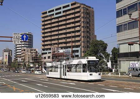 Stock Image - Kumamoto City Tram, Kumamoto, Kumamoto, Japan. Fotosearch