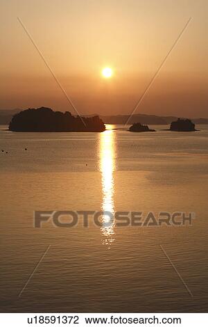 Stock Image - Sunset at Amakusa Matsushima, Kamiamakusa, Kumamoto, Japan. Fotosearch