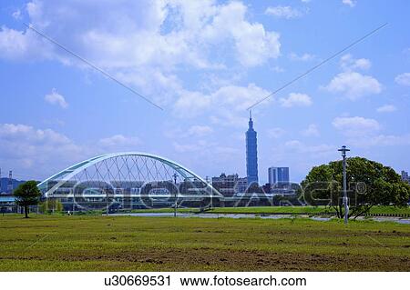 Stock Image - Taiwan, Taipei, Taipei 101, MacArthur 2nd Bridge, Caihong Riverside Park. Fotosearch