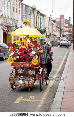 Picture - Malaysia, Melaka State, Jonker Street, Rickshaw. Fotosearch