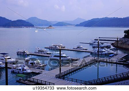 Stock Image - Asia, China, Taiwan, Nantou, Yuchih Township, Sun Moon Lake, Shuei-She Wharf. Fotosearch
