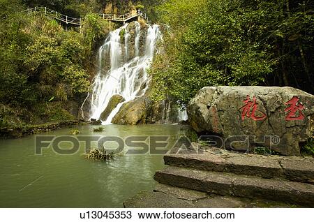 Stock Image - Asia, China, Fujian, UNESCO, World Cultural Heritage, World Natural Heritage, Wuyi Mountain, Yu Long Gu Jin Qu, Yu Long Gu, The Pearl Falls, Waterfall. Fotosearch