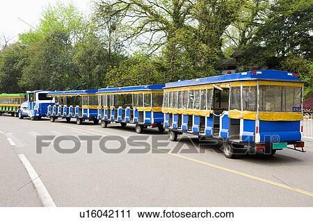 Asia, China, Fujian, UNESCO, World Cultural Heritage, World Natural Heritage, Wuyi Mountain, Visit a park car View Large Photo Image Stock Image - Asia, China, Fujian, UNESCO, World Cultural Heritage, World Natural Heritage, Wuyi Mountain, Visit a park car. Fotosearch