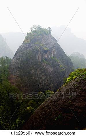 Asia, China, Fujian, UNESCO, World Cultural Heritage, World Natural Heritage, Wuyi Mountain, Tiger Roaring Rock Scenic Area, Tiger Roaring Rock View Large Photo Image Stock Photo - Asia, China, Fujian, UNESCO, World Cultural Heritage, World Natural Heritage, Wuyi Mountain, Tiger Roaring Rock Scenic Area, Tiger Roaring Rock. Fotosearch