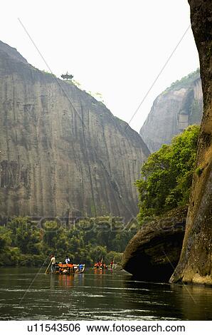 Stock Photograph - Asia, China, Fujian, UNESCO, World Cultural Heritage, World Natural Heritage, Wuyi Mountain, Nine-twist Stream Scenic Area, Heavenly Tour Peak, Nine-twist Stream, Floating On Water. Fotosearch