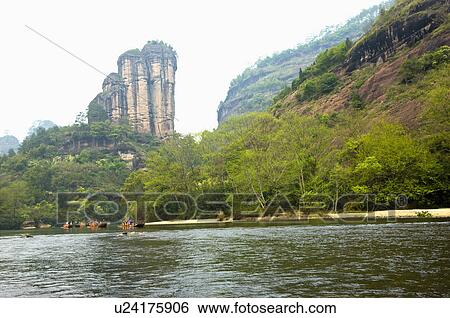 Stock Photograph - Asia, China, Fujian, UNESCO, World Cultural Heritage, World Natural Heritage, Wuyi Mountain, Nine-twist Stream Scenic Area, Jade Girl Peak, Nine-twist Stream, Floating On Water. Fotosearch