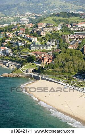 A sandy beach, Playa de Ondarreta, in Donostia-San Sebastian, Basque region of Spain, the Queen of Euskadi's and Cantabrian Coast, as seen from Monte Urgull overlook view spot View Large Photo Image Stock Image - A sandy beach, Playa de Ondarreta, in Donostia-San Sebastian, Basque region of Spain, the Queen of Euskadi's and Cantabrian Coast, as seen from Monte Urgull overlook view spot. Fotosearch