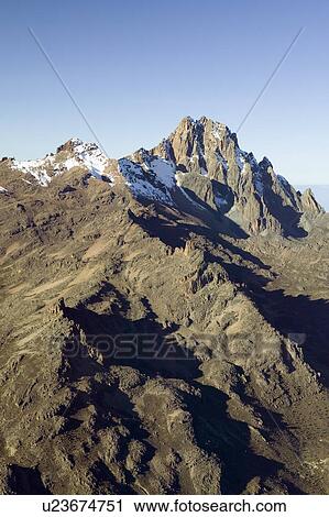 Aerial of Mount Kenya, Africa and snow in January, the second highest mountain at 17, 058 feet or 5199 Meters View Large Photo Image Stock Image - Aerial of Mount Kenya, Africa and snow in January, the second highest mountain at 17, 058 feet or 5199 Meters. Fotosearch