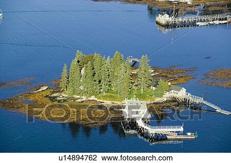 Stock Image - Aerial view of Boothbay Harbor and island on Maine coastline. Fotosearch