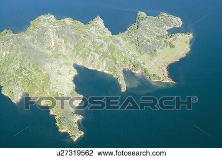 Stock Image - Aerial view of lake island within Lake Casitas in spring in Ventura County, Ojai, California. Fotosearch