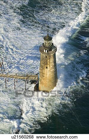 Aerial view of lighthouse at sea surrounded by water on Maine coastline, south of Portland View Large Photo Image Stock Photo - Aerial view of lighthouse at sea surrounded by water on Maine coastline, south of Portland. Fotosearch