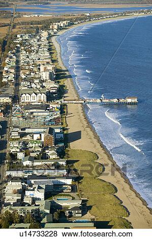 Aerial view of Old Orchard Beach downtown, pier, new hotel and amusement park on Maine Coastline south of Portland View Large Photo Image Stock Photo - Aerial view of Old Orchard Beach downtown, pier, new hotel and amusement park on Maine Coastline south of Portland. Fotosearch