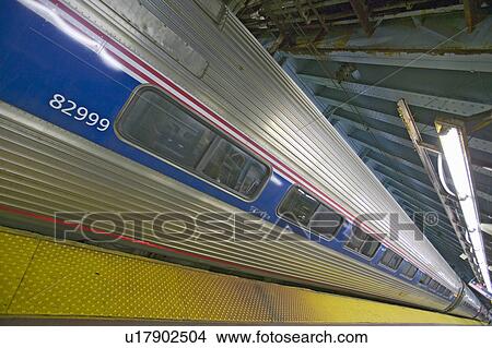 Picture - Angled view of Amtrak train in Penn Station, New York City, Manhattan, New York. Fotosearch