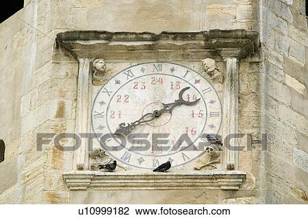 Clock face detail on the Igreja da Santa Maria dos Olivais, considered as the mother church of the Order of the Knights Templar in Portugal and the resting place of many of the past Masters, Tomar, Portugal View Large Photo Image Stock Image - Clock face detail on the Igreja da Santa Maria dos Olivais, considered as the mother church of the Order of the Knights Templar in Portugal and the resting place of many of the past Masters, Tomar, Portugal. Fotosearch