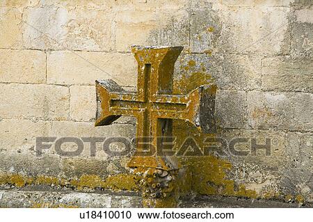 Detail of early Christian cross on wall of Chapter House, Templar Castle and the Convent of the Knights of Christ, founded by Gualdim Pais in 1160 AD, is a Unesco World Heritage Site in Tomar, Portugal View Large Photo Image Stock Image - Detail of early Christian cross on wall of Chapter House, Templar Castle and the Convent of the Knights of Christ, founded by Gualdim Pais in 1160 AD, is a Unesco World Heritage Site in Tomar, Portugal. Fotosearch