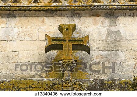 Detail of early Christian cross on wall of Chapter House, Templar Castle and the Convent of the Knights of Christ, founded by Gualdim Pais in 1160 AD, is a Unesco World Heritage Site in Tomar, Portugal View Large Photo Image Stock Photograph - Detail of early Christian cross on wall of Chapter House, Templar Castle and the Convent of the Knights of Christ, founded by Gualdim Pais in 1160 AD, is a Unesco World Heritage Site in Tomar, Portugal. Fotosearch