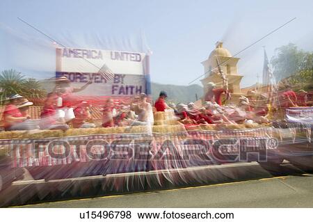 Festive float makes its way down main street during a Fourth of July parade in Ojai, CA View Large Photo Image Stock Photo - Festive float makes its way down main street during a Fourth of July parade in Ojai, CA. Fotosearch