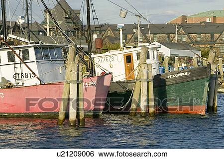 Stock Photograph - Fishing boats in harbor at Newport, Rhode Island. Fotosearch