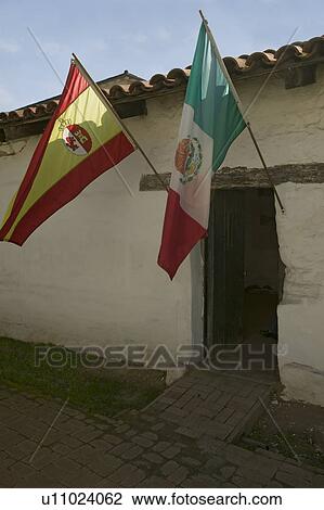Flags hang on adobe building along highway 33 between Ojai and Lockwood Valley View Large Photo Image Stock Image - Flags hang on adobe building along highway 33 between Ojai and Lockwood Valley. Fotosearch
