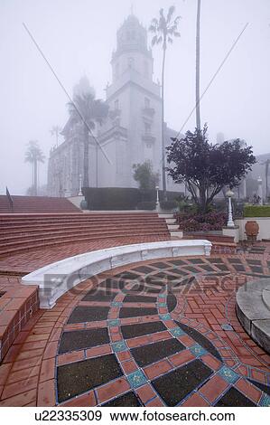 Hearst Castle, "America's Castle, " in a fog with palm trees, San Simeon, Central California Coast View Large Photo Image Stock Photo - Hearst Castle, "America's Castle, " in a fog with palm trees, San Simeon, Central California Coast. Fotosearch