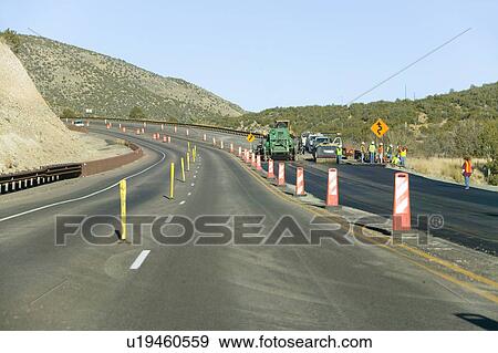 Highway workers work on state highway on Mescalero Apache Indian Reservation near Ruidoso and Alto, New Mexico View Large Photo Image Stock Photo - Highway workers work on state highway on Mescalero Apache Indian Reservation near Ruidoso and Alto, New Mexico. Fotosearch