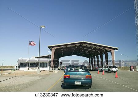 Stock Photo - Immigration and Naturalization Service, INS, roadside stop Route 54, in southern New Mexico, in search of illegal immigrants from Mexico and Central America. Fotosearch