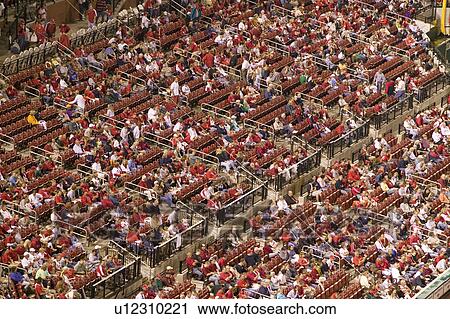 In a night game and a light rain mist a crowd watches the Florida Marlins beat the 2006 World Series Champion baseball team, the St. Louis Cardinals 9 to 1, at the 3rd Busch Stadium, St. Louis, Missouri on August 29, 2016 View Large Photo Image Stock Image - In a night game and a light rain mist a crowd watches the Florida Marlins beat the 2006 World Series Champion baseball team, the St. Louis Cardinals 9 to 1, at the 3rd Busch Stadium, St. Louis, Missouri on August 29, 2016. Fotosearch