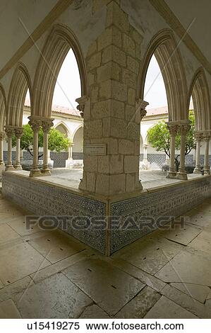 Stock Photography - Interior arches of the Convent of the Knights of Christ and Templar Castle, founded by Gualdim Pais in 1160 AD, is a Unesco World Heritage Site in Tomar, Portugal. Fotosearch