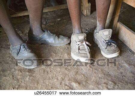 Karimba School, view of school children's shoes on bare floor of classroom in North Kenya, Africa View Large Photo Image Stock Photo - Karimba School, view of school children's shoes on bare floor of classroom in North Kenya, Africa. Fotosearch