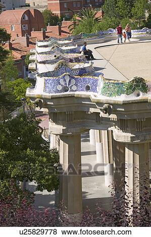 Stock Photo - Magical homes of Antoni Gaudi's Parc Guell, Barcelona, Spain. Fotosearch