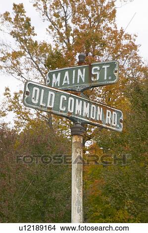 Main Street USA and Old Common Road sign in autumn, western Massachusetts, New England View Large Photo Image Picture - Main Street USA and Old Common Road sign in autumn, western Massachusetts, New England. Fotosearch