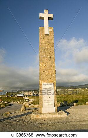 Stock Photo - Monument at Cabo da Roca on the Atlantic Ocean in Sintra, Portugal, the westernmost point on the continent of Europe, which the poet Camões defined as "where the land ends and the sea begins".. Fotosearch