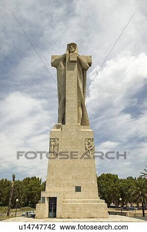 Stock Image - Monumento a Cristobal Colón, a huge monument of Christopher Columbus by American architect G. V. Whitney, situated at the Punta de Sebo overlooking the confluence of the Odiel and Tinto rivers, Huelva Province, Andalucia, Spain. Fotosearch