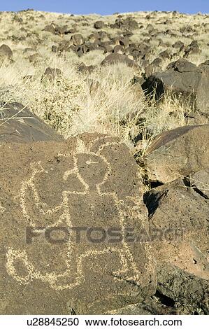 Stock Image - Native American petroglyphs at Petroglyph National Monument, outside Albuquerque, New Mexico. Fotosearch