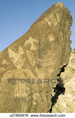 Stock Photograph - Native American petroglyphs at Petroglyph National Monument, outside Albuquerque, New Mexico. Fotosearch