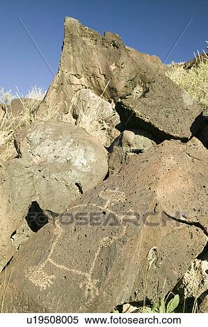 Stock Photography - Native American petroglyphs at Petroglyph National Monument, outside Albuquerque, New Mexico. Fotosearch