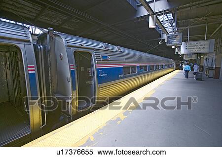 Stock Photography - Pre-boarding at an Amtrak East Coast train station platform on the way to New York City, New York, Manhattan, New York. Fotosearch
