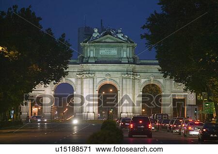Stock Image - Puerta de Alcala at night, Madrid, Spain. Fotosearch