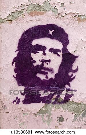 Stock Image - Stencil of Cuban revolutionary and icon, Che Guevara, on building in Tomar, Portugal. Fotosearch