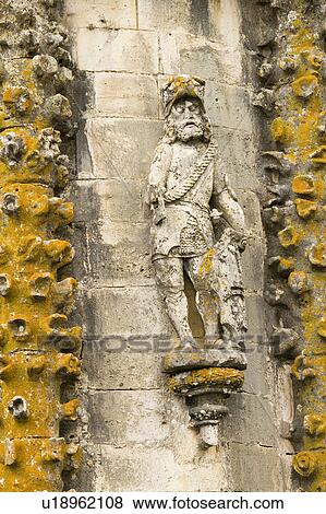 Stock Photo - Stone detail of Knight on wall of Chapter House, Templar Castle and the Convent of the Knights of Christ, founded by Gualdim Pais in 1160 AD, is a Unesco World Heritage Site in Tomar, Portugal. Fotosearch