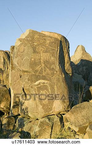 Stock Image - Three Rivers Petroglyph National Site, a (BLM) Bureau of Land Management Site, features more than 21, 000 Native American Indian petroglyphs and examples of prehistoric Jornada Mogollon rock art, off Route 54, South of Carrizozo, New Mexico. Fotosearch